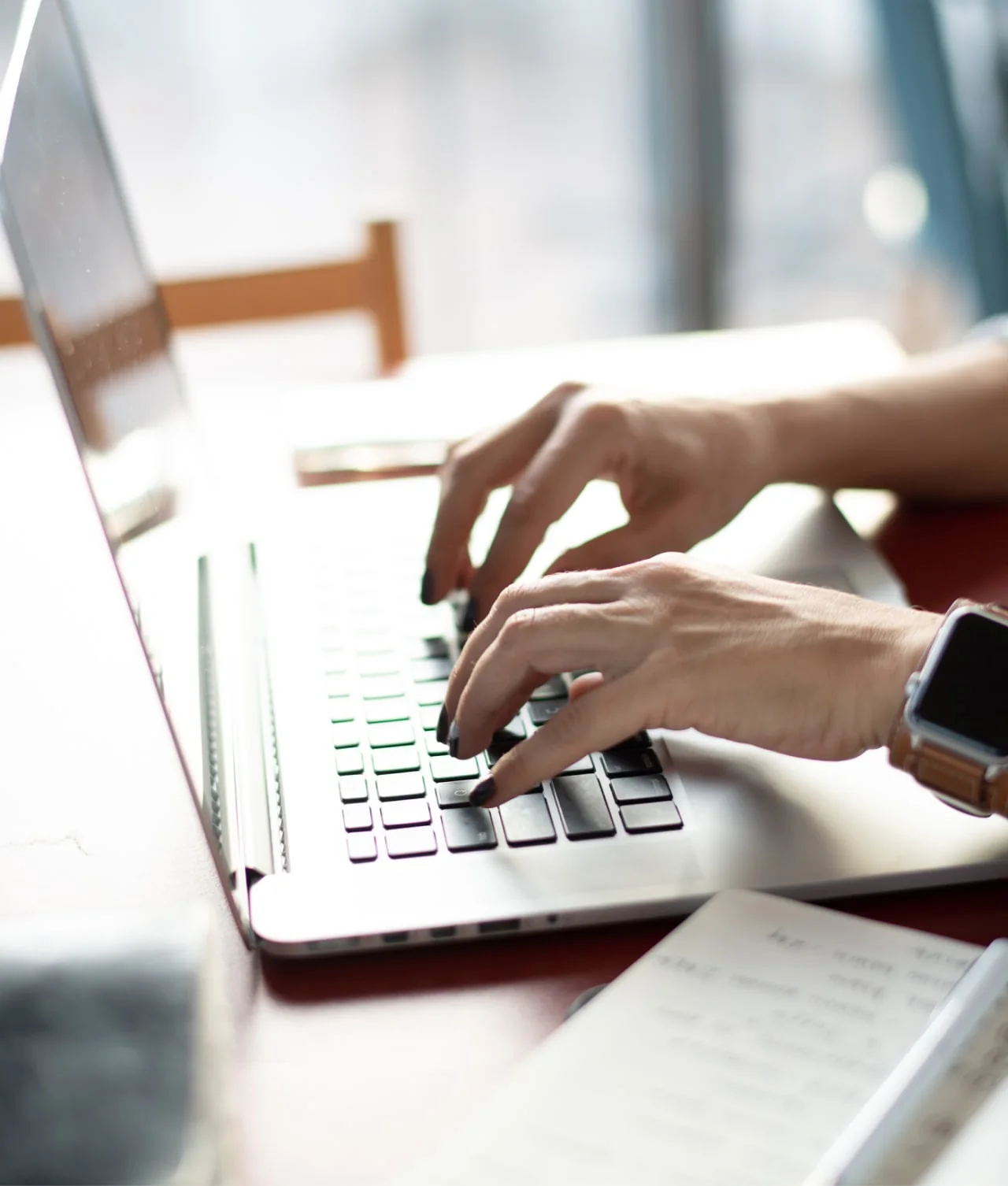 Hands typing on a laptop — getting a US operation running