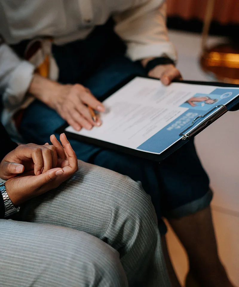 A Business Experts US advisor reviewing US market plans with a client